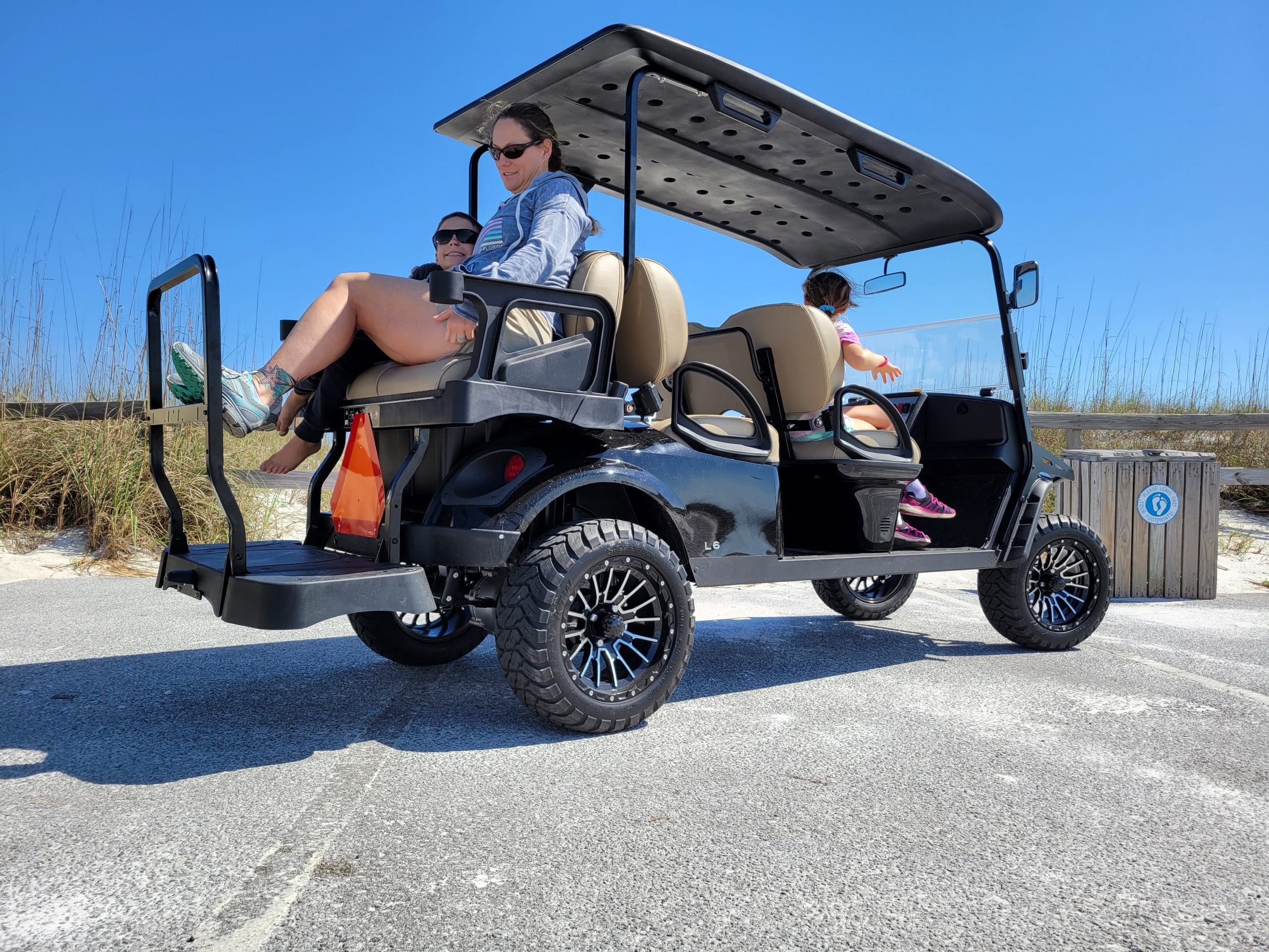 6-seater street legal golf cart rental Pensacola Beach.